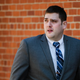 Former East Pittsburgh police officer Michael Rosfeld, charged with homicide in the shooting death of Antwon Rose II, walks to the Dauphin County Courthouse in Harrisburg, Pa., Tuesday, March 12, 2019. (AP Photo/Matt Rourke)